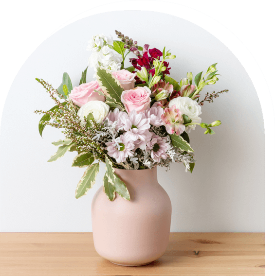 Flowers In A Pink Ceramic Vase — Experienced Florists in Toronto, NSW